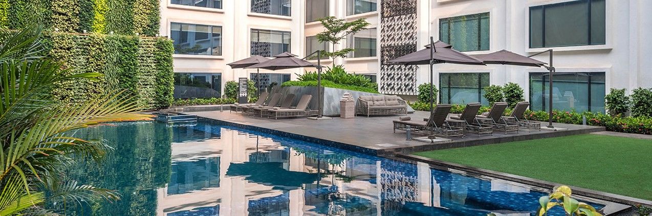 Hyatt Centric Candolim Goa Exterior foto The swimming pool at the hotel